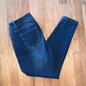 Classic brand skinny jeans. Size 9. Minor distressing on thigh area.